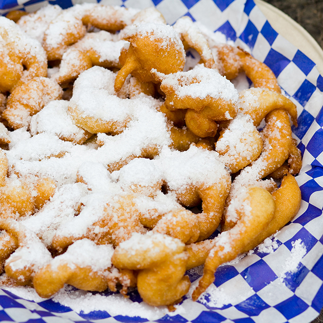 funnel cake covered in powdered sugar