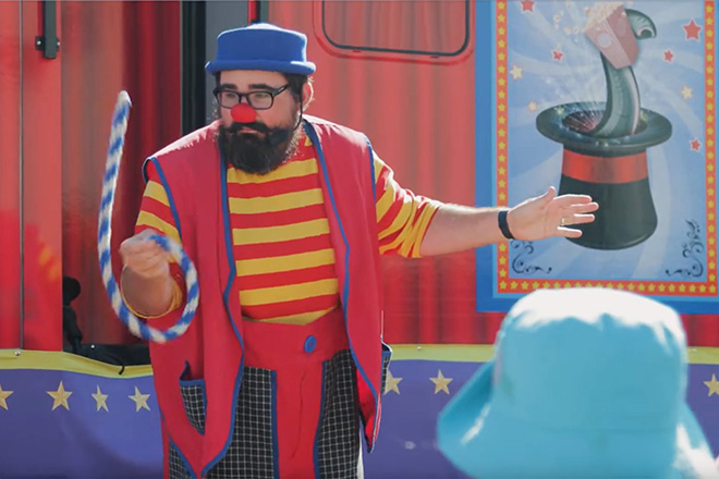 Lew-E the clown plays with a rope