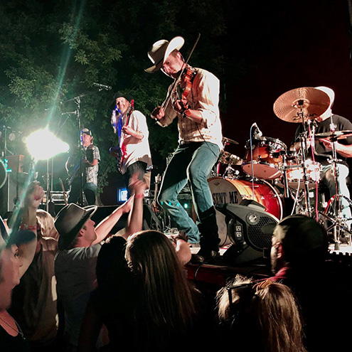 members of Gus Sent Me performing live