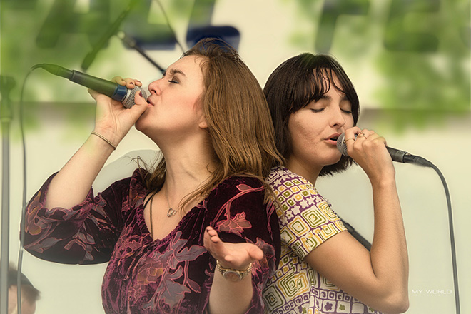 two women of Sawyers Dream band singing