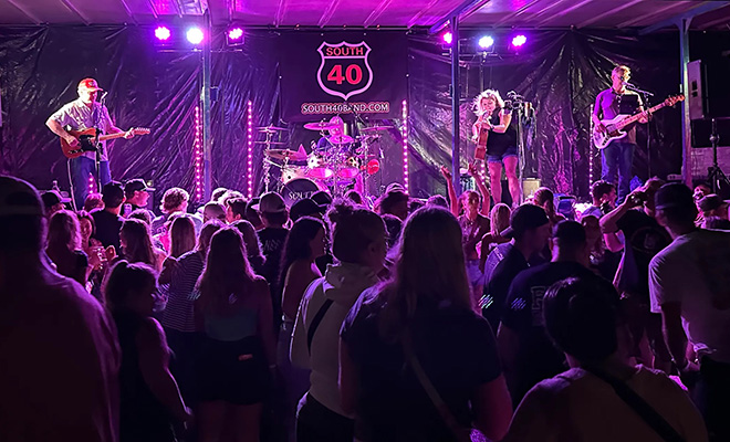 South 40 performing at night